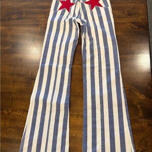 Striped Blue and White free people bell bottom Jeans with Red Star Accents
